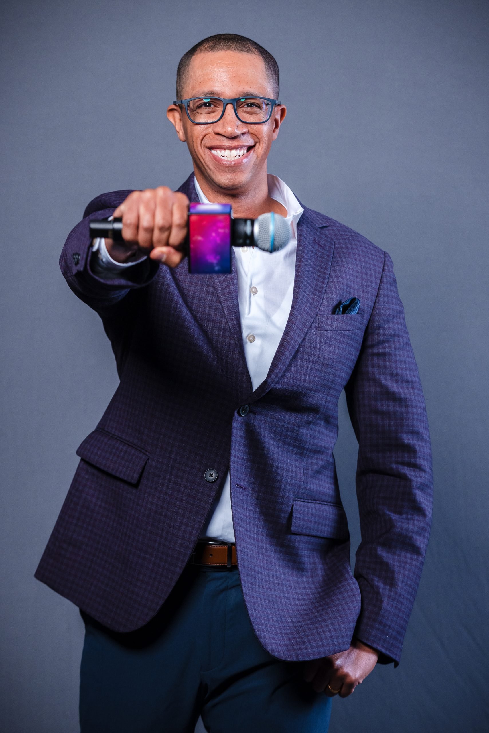 Devon Brown Keynote Speaker Holding Microphone